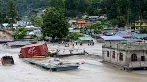 14 dead, 100 missing in flash flood