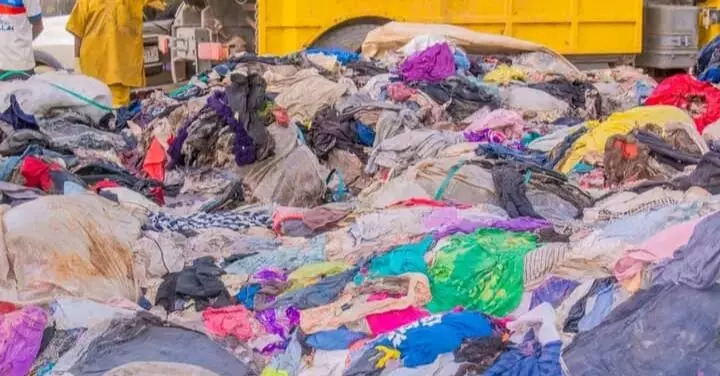 Customs bury seized second-hand clothes worth millions